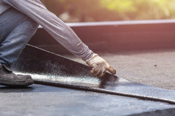 Professional Basement Waterproofing technician working in Versailles, IN